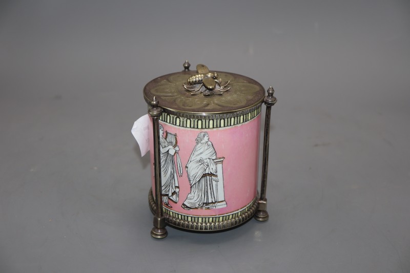 A Staffordshire pottery preserve pot, raised in a plated stand, the lid with a bee finial, height 13cm